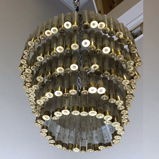Load image into Gallery viewer, Chandelier made-with shotgun cartridges-

